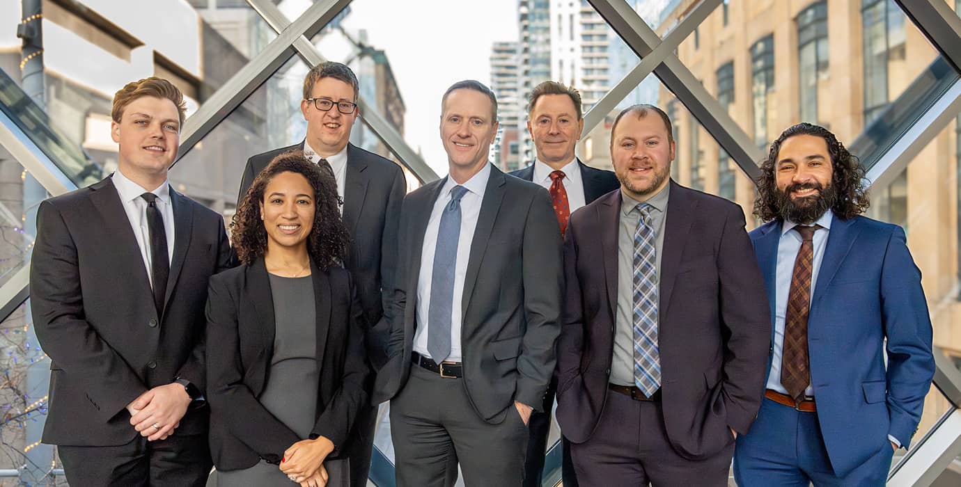 The legal team at Madigan, Dahl & Harlan, P.A.